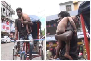 Baby In One Hand Rickshaw In Other