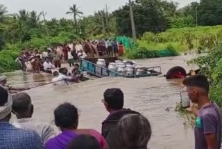 People washed away in rain water: VIDEO