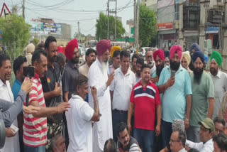 Residents block road