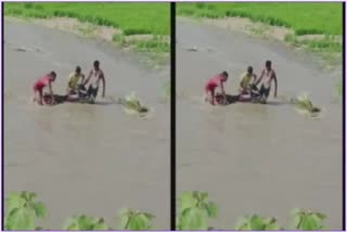 man including bike drowned in water