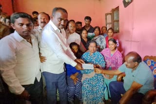 Handover of aid to Boregowda's family