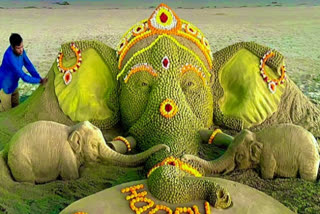 Sand artist Sudarsan carves 6-ft tall Ganesha sand idol at a Puri beach