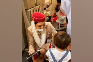 air hostess greets toddler