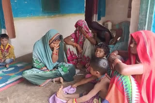 Grieving family members of the deceased child