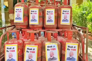 trs-slams-bjp-through-a-video-of-prime-minister-narendra-modi-photo-on-lpg-cylinder