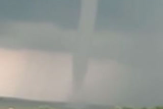 Tornado barreling up on Manjira river