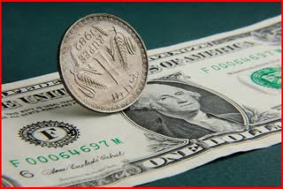 Rupee falls 12 paise to 79.90 against US dollar