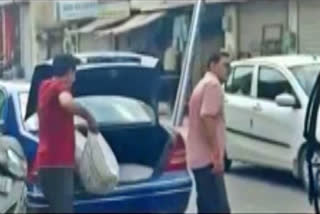 Watch: Man loads Mercedes with sacks of wheat meant for poor