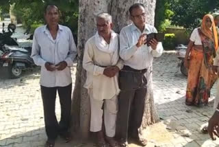 Water supply department employees tied to tree in Alwar as protest of irregular water supply