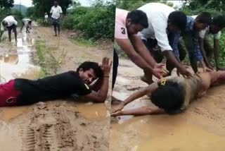 A Young man protested by rolling over the road  Ward member rolling over the road  Ward member protesting by rolling over the road  protesting by rolling over the road  റോഡില്‍ ശയനപ്രതിക്ഷണം ചെയ്‌ത് വാര്‍ഡ് മെമ്പര്‍  Ward member  വാര്‍ഡ് മെമ്പര്‍  പ്രതിഷേധം  protest  അമരാവതി