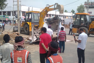 Bulldozer run encroachment Singrauli