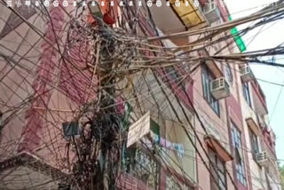 bunch of wires on electric poles hari nagar