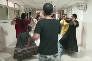 Women are preparing for Garba and Dandiya