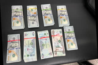 Passenger arrested with foreign currency