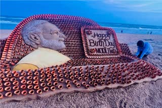Sand artist Sudarsan Pattnaik wishes PM Modi on his birthday with sculpture