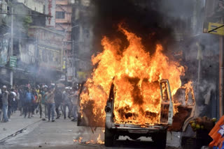 police reach at Beldanga to investigate car fire case during BJP Nabanna Abhijan