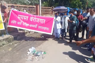 Employed youth protest for conducting nursing examination in dehradun