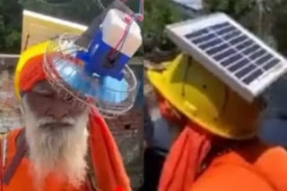 SADHU VIRAL VIDEO WEARING SOLAR POWERED HELMET FAN