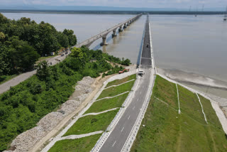 Union Minister Kiren Rijiju inspects the 7th Kaliabhomora II bridge over the Brahmaputra