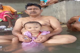 Two year old innocent gave tarpan to his father