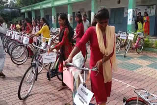 Education Minister Distributed Scooty And Cycle