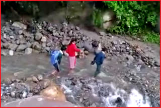 children risking their lives by crossing Nala.