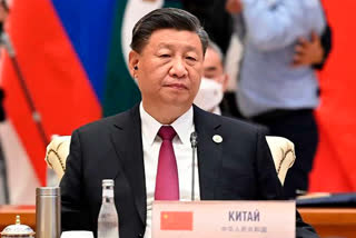 Xi