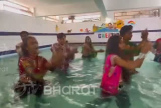 Watch: People plays Garba in swimming pool in Rajasthan