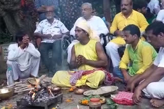 Minister Pradip Majumdar performs puja in Kanksa