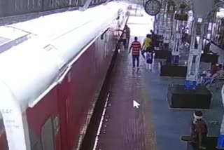 policeman saves passenger falling from train