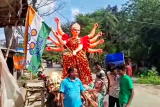 A local Trinamool Congress party member justified the act stating that it was a mere token of gratitude as the State had doled out Rs 60,000 to all public Puja Committees.