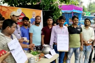 BJP Yuva Morcha sell tea puffed rice in front of Durga Puja Mandap