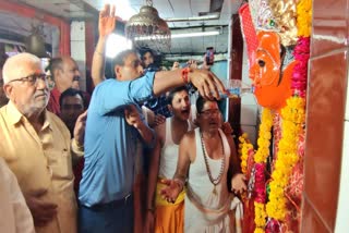 Collector offers 'madira' to goddesses, seek blessings for the prosperity of the city.