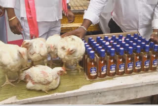 Watch: TRS Legislator distributes alcohol and chicken as Dussehra gifts in Warangal