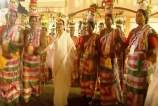 Mamta Banerjee dances with folk artists