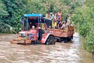 tractor-stuck-in-the-water-at-vijaypur