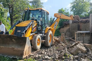 Bulldozer action accused house