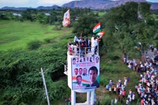 Congress MP Rahul Gandhi with other congress leader climbed a water tank to wave the national flag