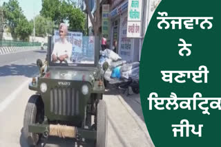 young man made an electric jeep