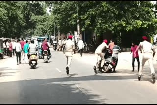 SCOOTY RIDER WAS PUSHED DOWN BY POLICE IN JAMUI