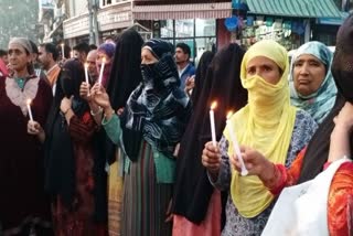 Candle march in Anantnag to protest the murder