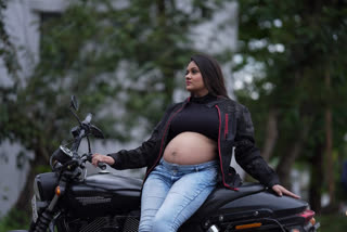 Pregnant woman flaunts baby bump riding Harley Davidson