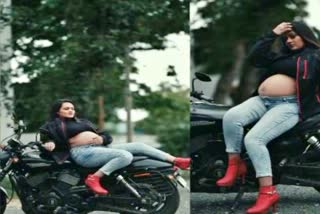 Baby bump photo shoot on Harley Davidson Bike