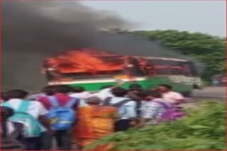 A bus traveling on The Road Caught Fire