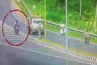 The bike collided with the divider after overtaking the SUV