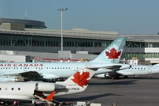 Toronto Island airport evacuated due to bomb threat two detained