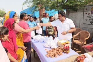 sweets and diyas distributed in jai hind camp