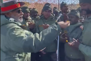 On Diwali, PM Modi distribute sweets to soldiers in Kargil