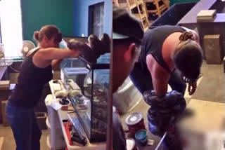 Viral video: Woman left struggling after pet python wraps around her arm