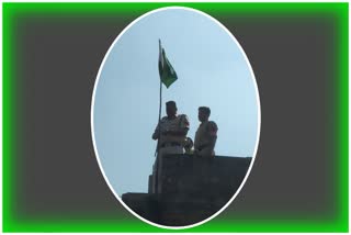 Allegedly Hoisting Pakistani Flag